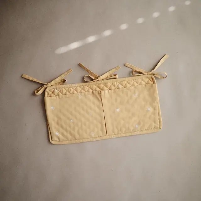 Mushie Crib Pocket - Sun 2