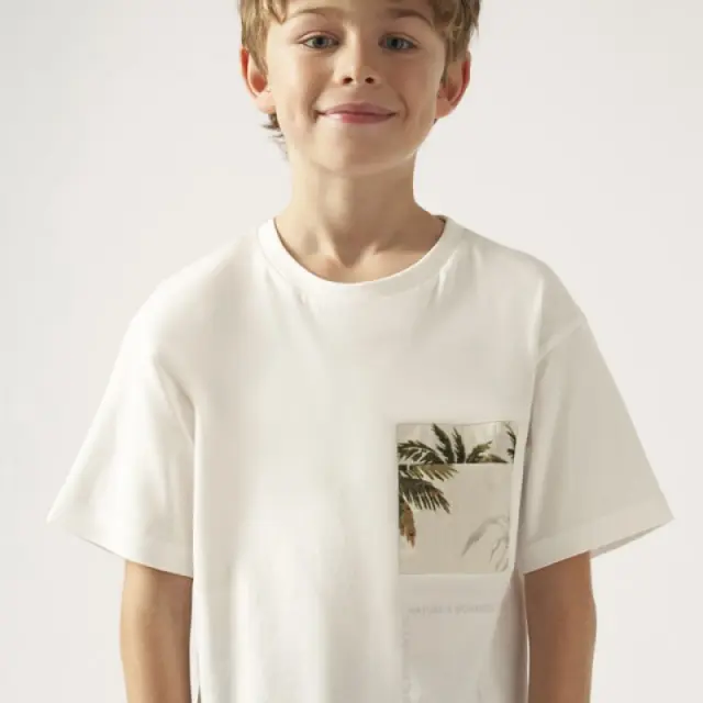 Junior 10 έως 18 ετών Μπλούζα τσέπη Better Cotton κρεμ - 14Ε