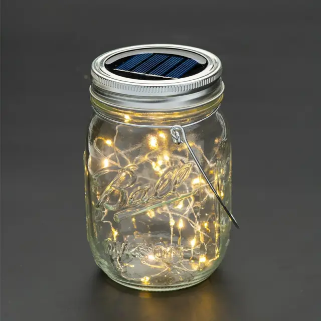 AcaLight Offer ΓΥΑΛΙΝΟ ΒΑΖΟ ΜΕ ΑΣΗΜΙ ΚΑΠΑΚΙ ΜΕ 20 LED ΗΛΙΑΚΑ ΛΑΜΠΑΚΙΑ ΣΕ ΣΕΙΡΑ ΘΕΡΜΟ ΛΕΥΚΟ ΜΕ ΚΑΛΩΔΙΟ ΧΑΛΚΟΥ IP44 Φ77x135mm