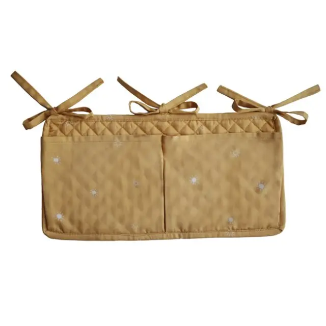 Mushie Crib Pocket - Sun