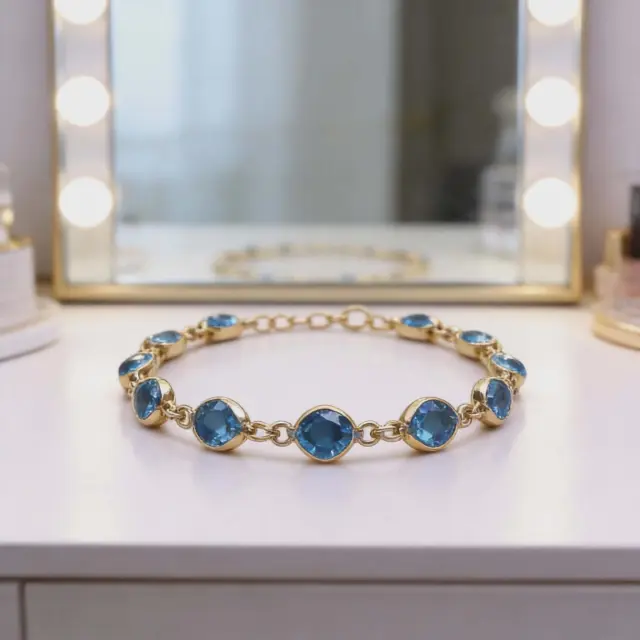 Gold Bracelet with Blue Crystal Stones