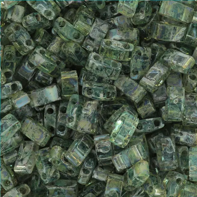 Χάντρα Miyuki Half Tila No4506 Picasso Olivine Transparent ~7gr